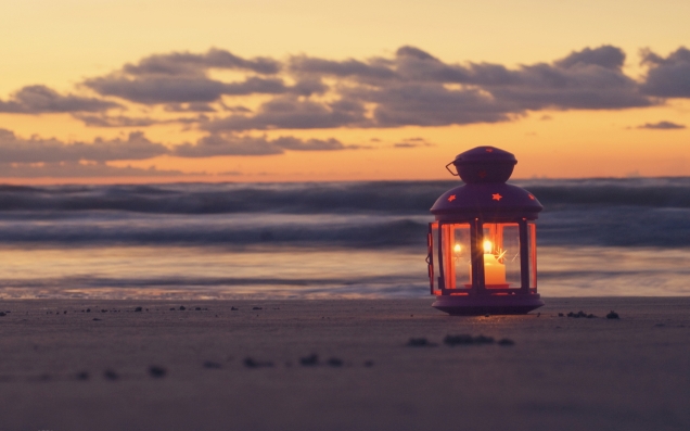 7014184-sunset-candle-beach